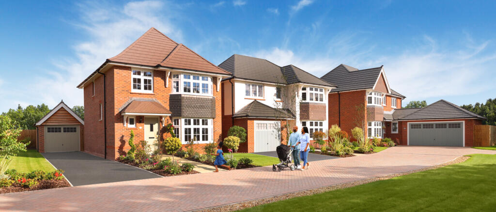 Modern red-brick houses with grey rooftops, surrounded by well-kept gardens and a family walking on