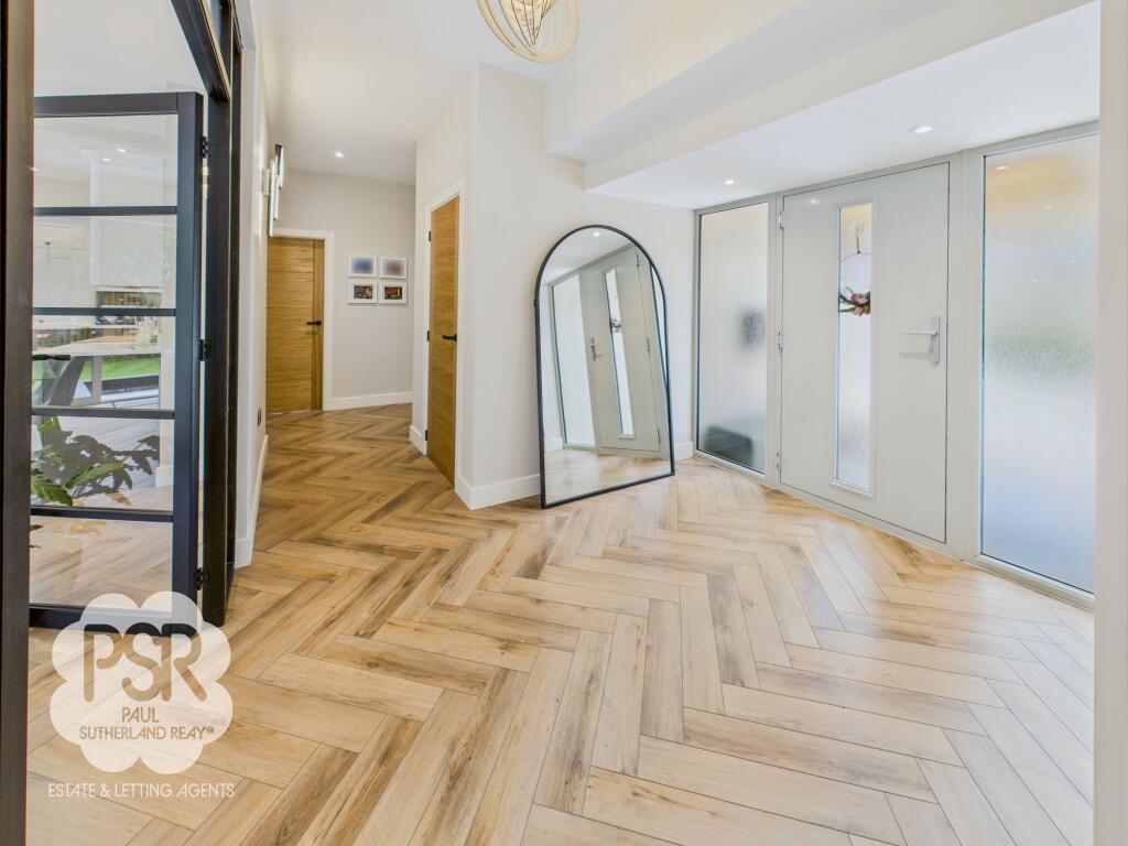 Herringbone Floored Main Hallway