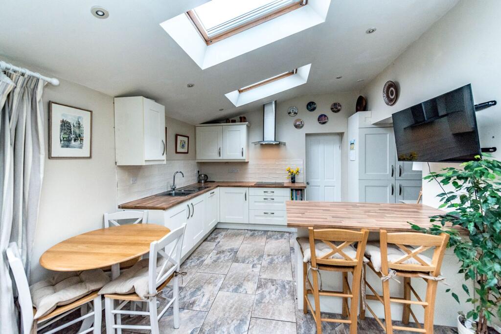 SITTING ROOM DINING KITCHEN AND UTILITY ROOM