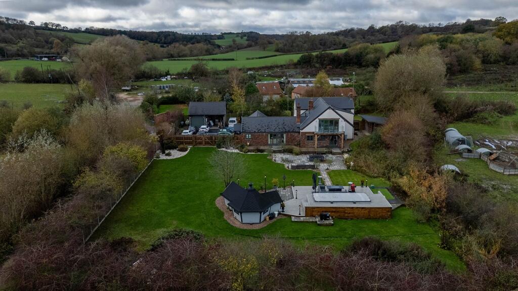 Set within around an acre of lush garden