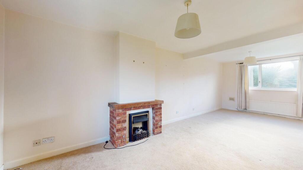 THROUGH LOUNGE/DINING ROOM