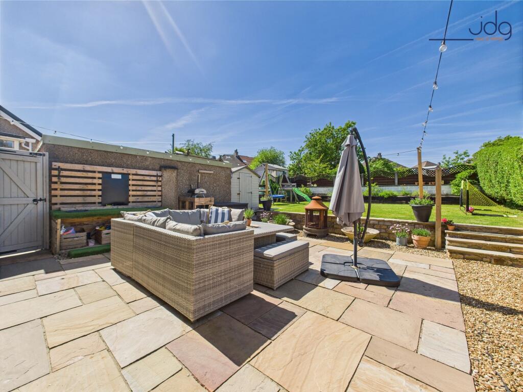 Landscaped rear garden with Indian stone patio