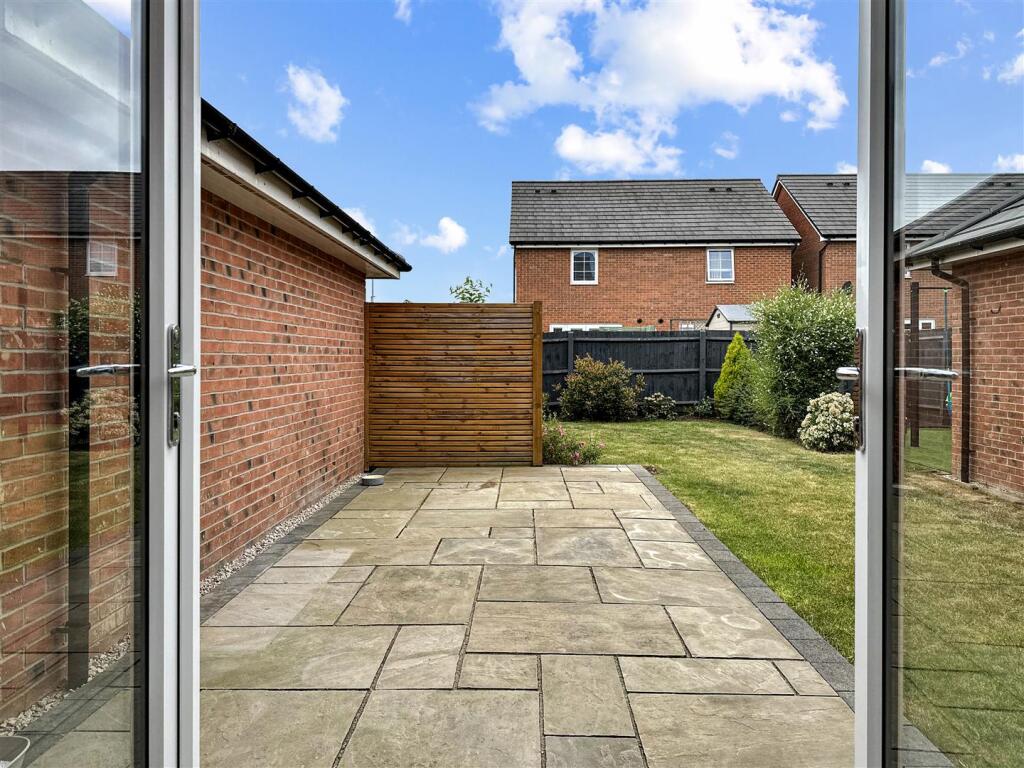 French Door Onto Paved Seating Area 767