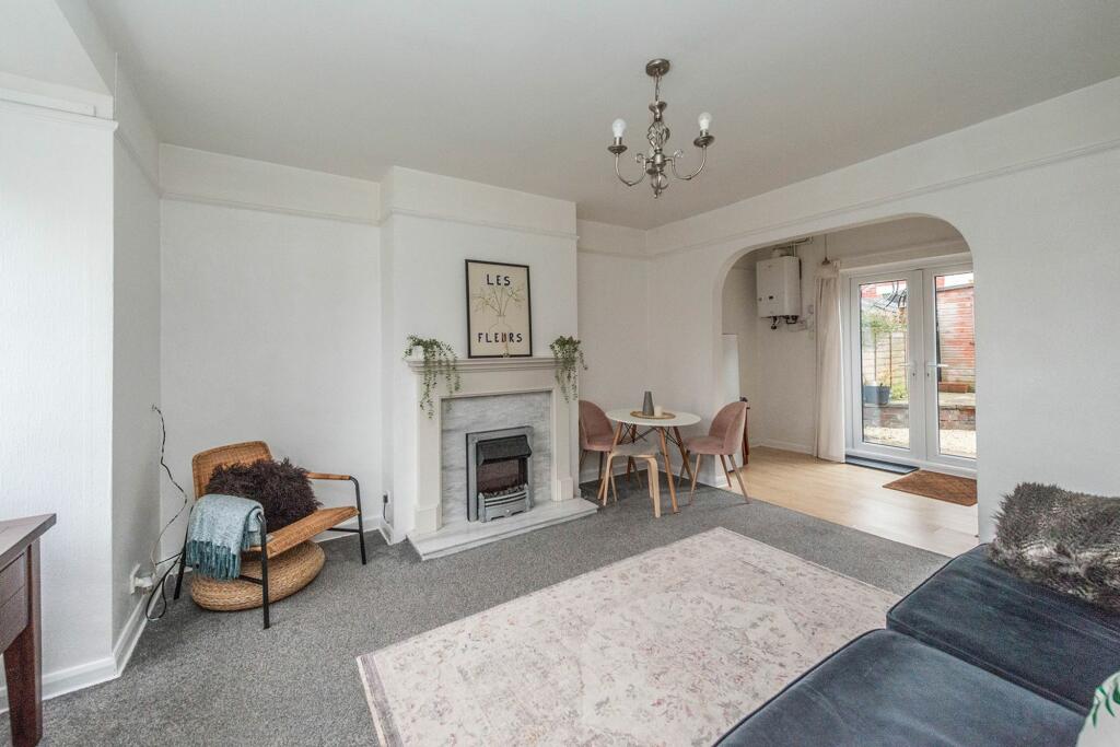 SITTING ROOM AND KITCHEN