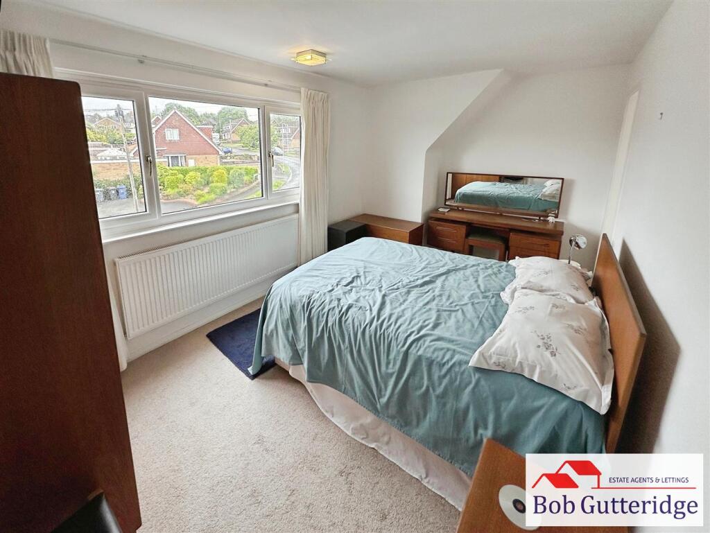 BEDROOM ONE (FRONT)