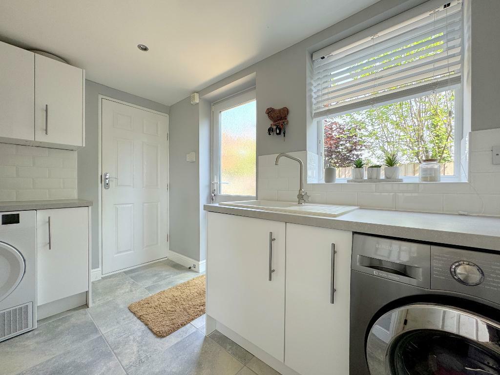 Utility with door to garage