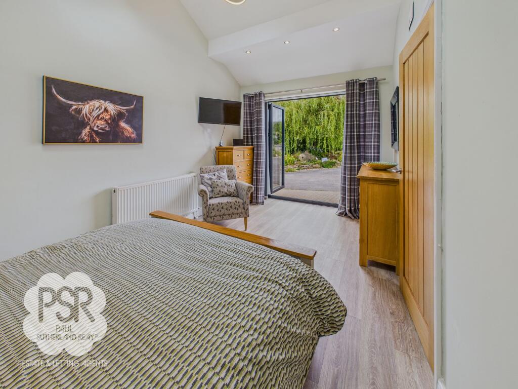 Annexe Bedroom with Bifold Doors