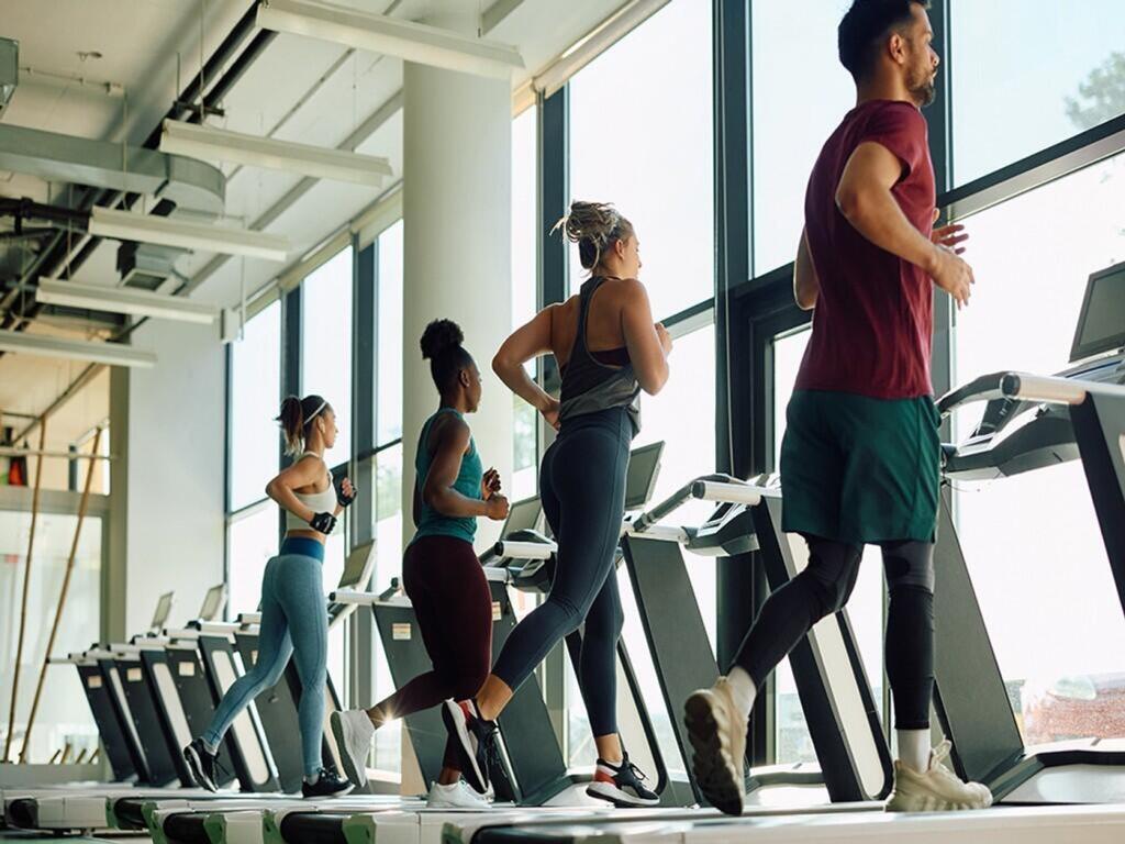 A bright and modern gym featuring state-of-the-...
