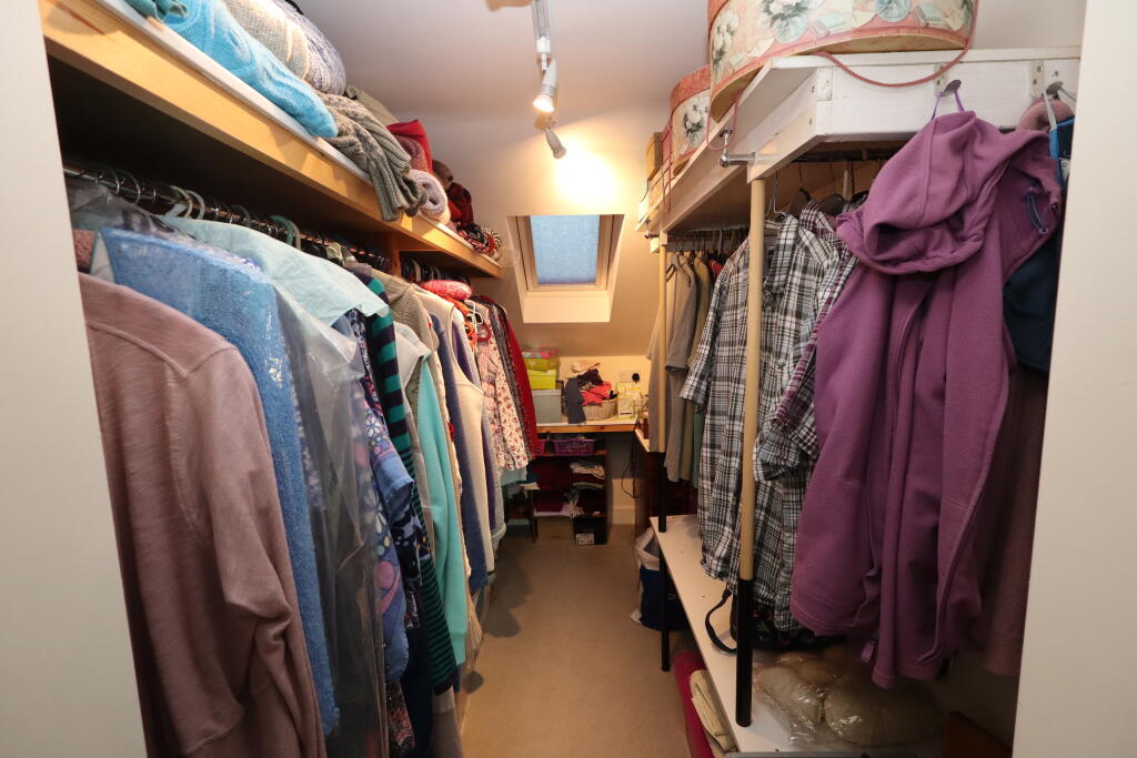 Walk in wardrobe to bedroom 1