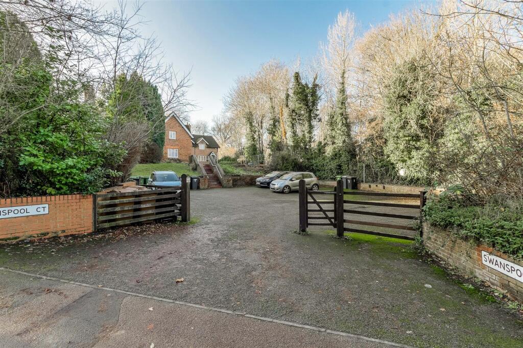 Entrance to parking area off Doddington Road