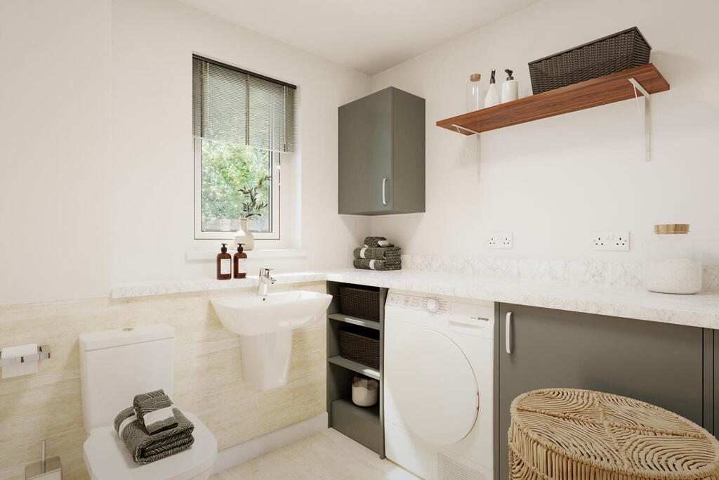 The handy utility room is perfect for keeping your laundry hidden away