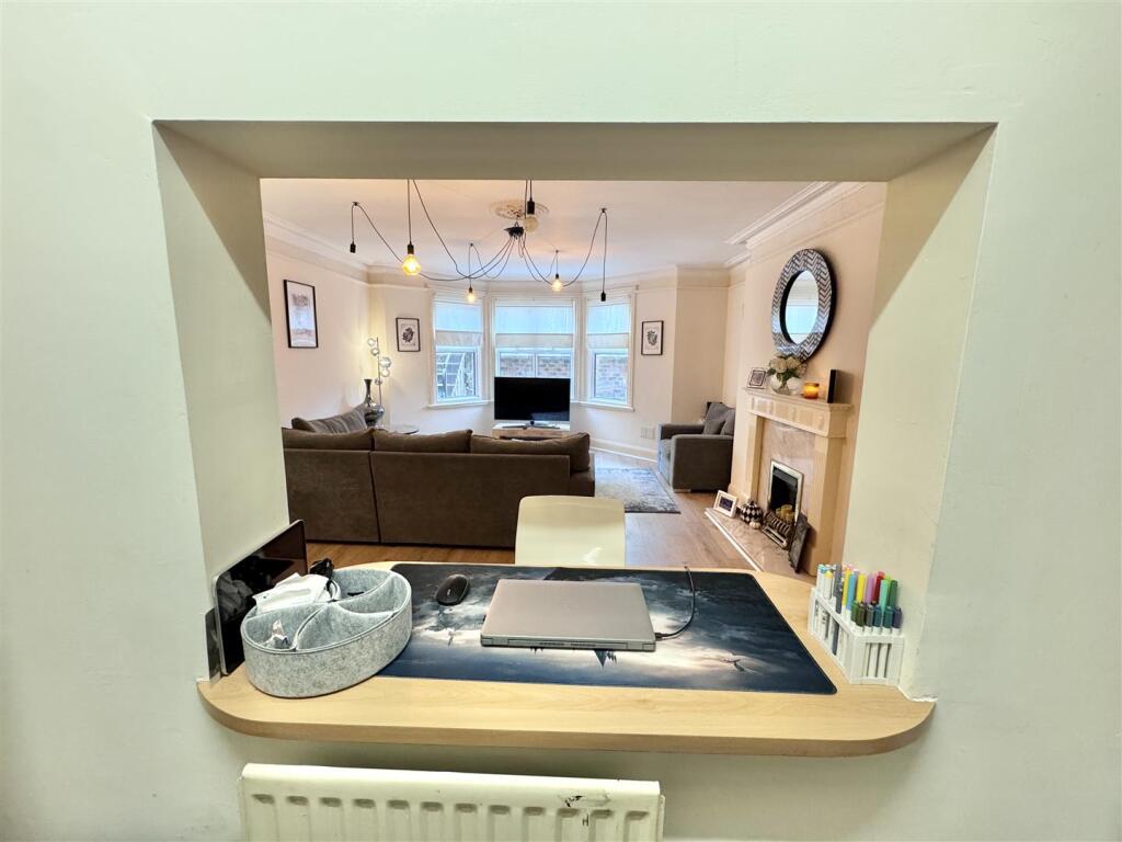 From kitchen into lounge