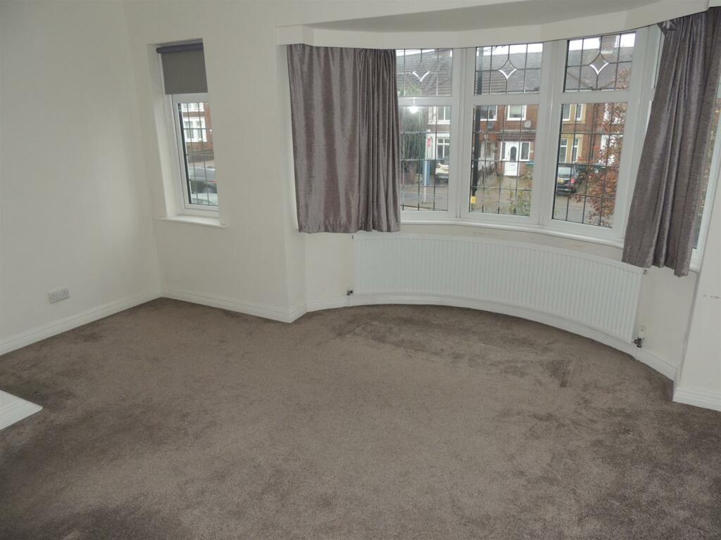 BEDROOM ONE (FRONT)