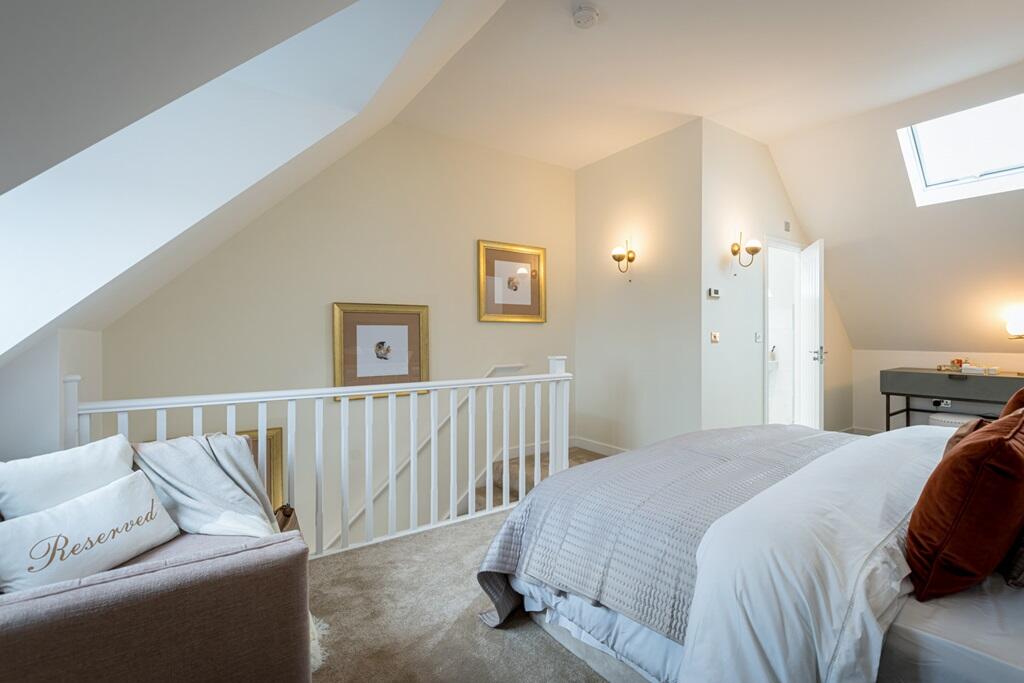A convenient en-suite sits off the main bedroom