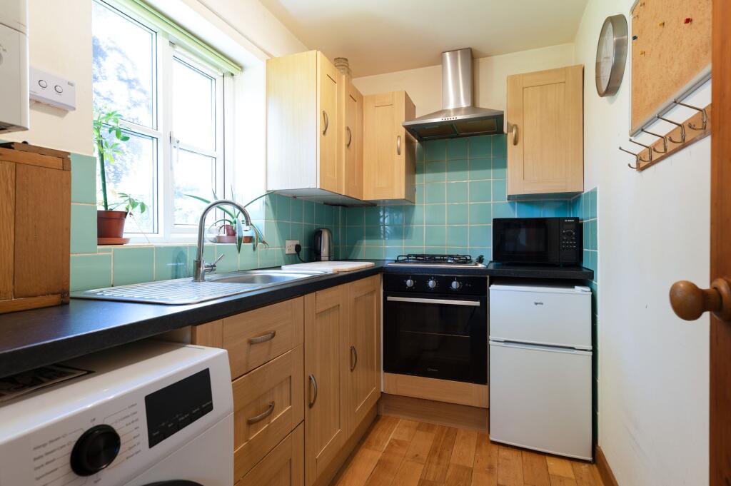 KITCHEN, DINER AND LIVING ROOM