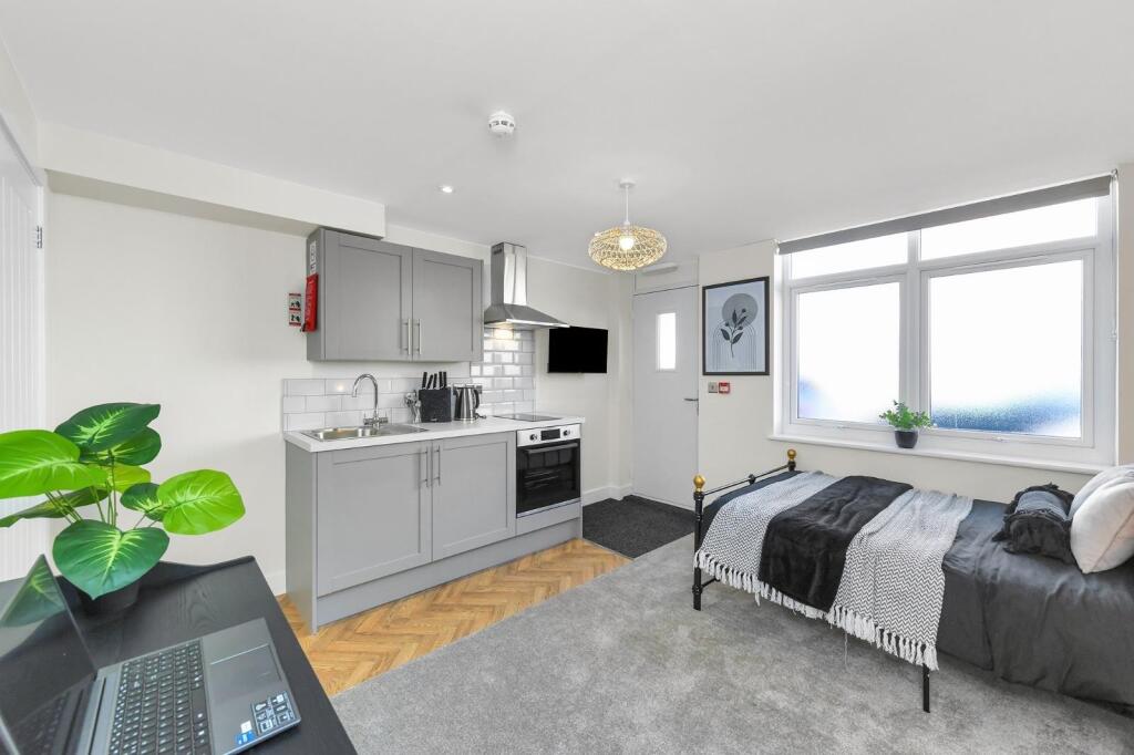 A beautifully designed double bedroom featuring...