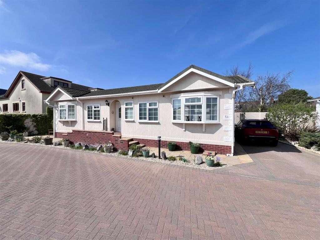Front with Driveway to Right Hand Side