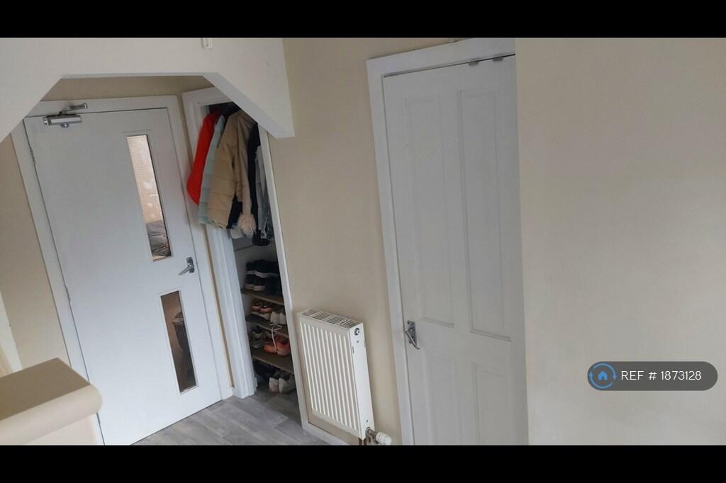 Hallway With Two Storage Cupboards 