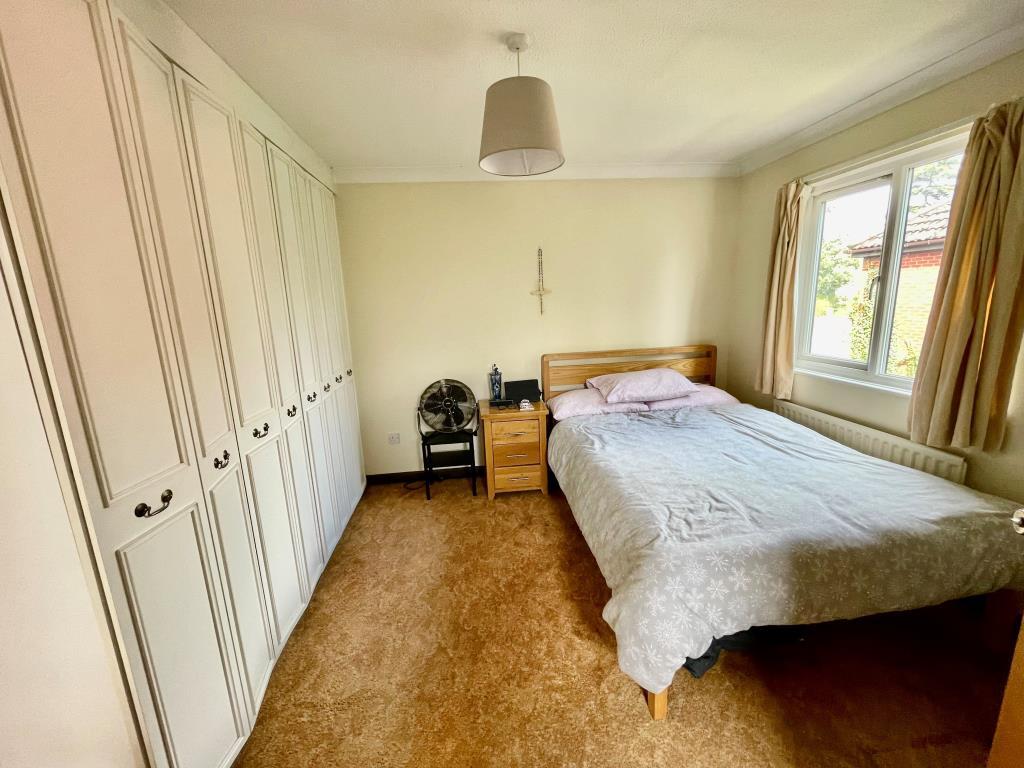 Master bedroom with fitted wardrobes