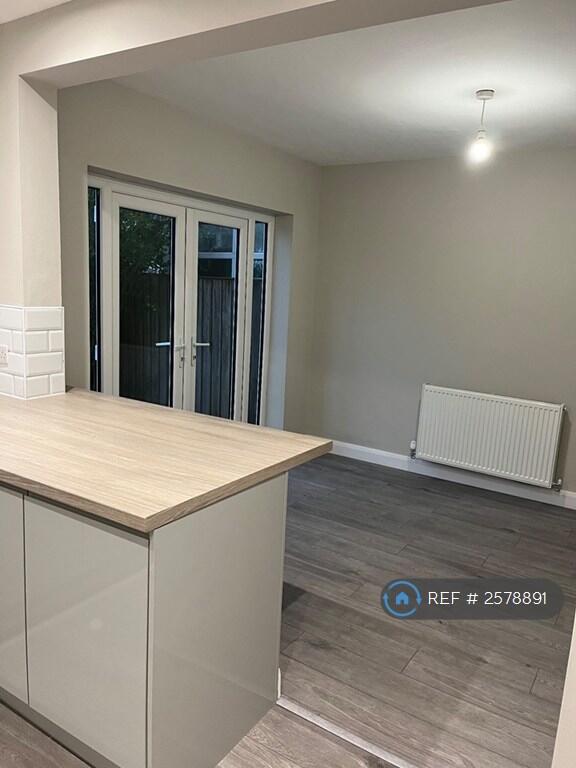 Open Plan Kitchen/Dining Room With French Doors