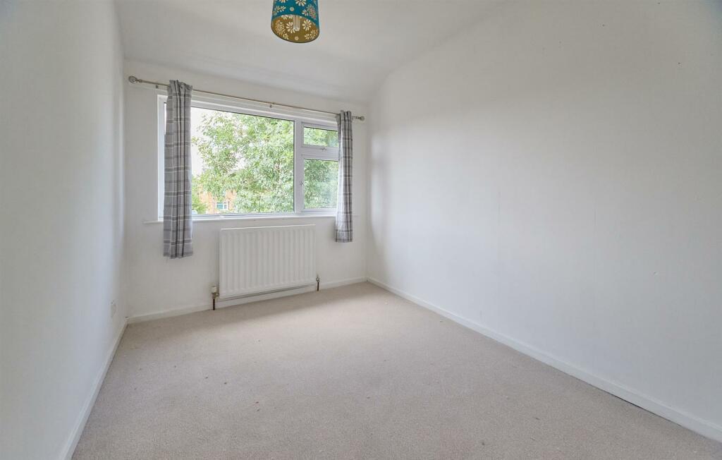 BEDROOM TWO TO REAR