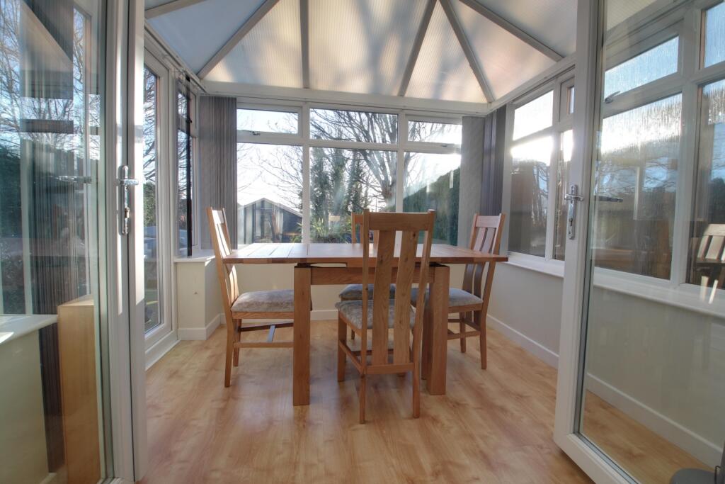 Conservatory overlooking the back garden