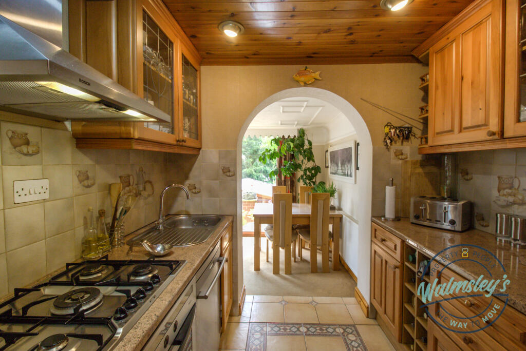 Kitchen with dining beyond