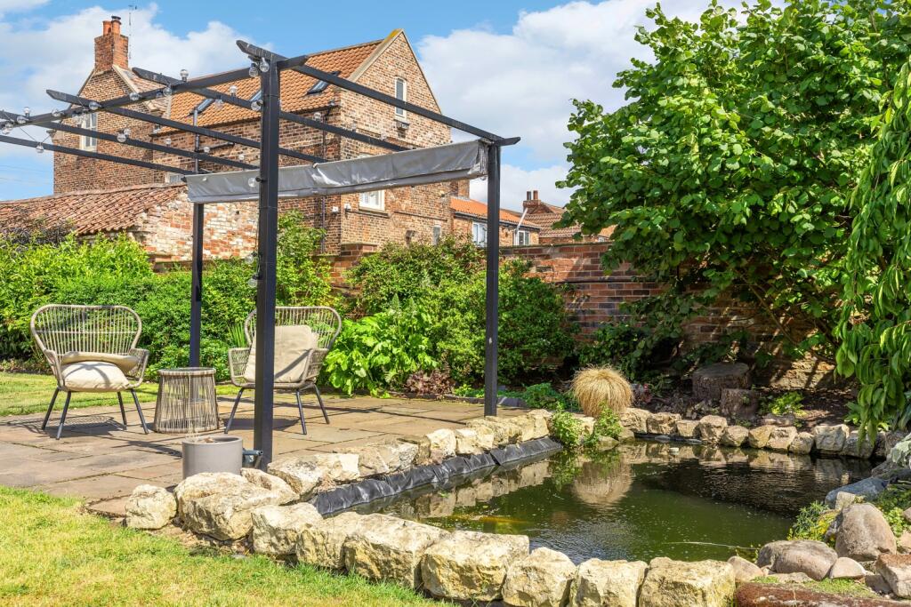 Garden Patio Area And Pond