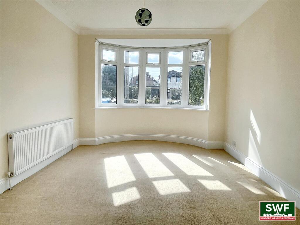THROUGH LOUNGE/DINING ROOM
