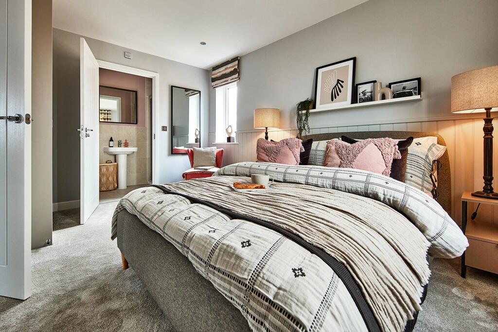 Bedroom 1 benefits from an en-suite bathroom