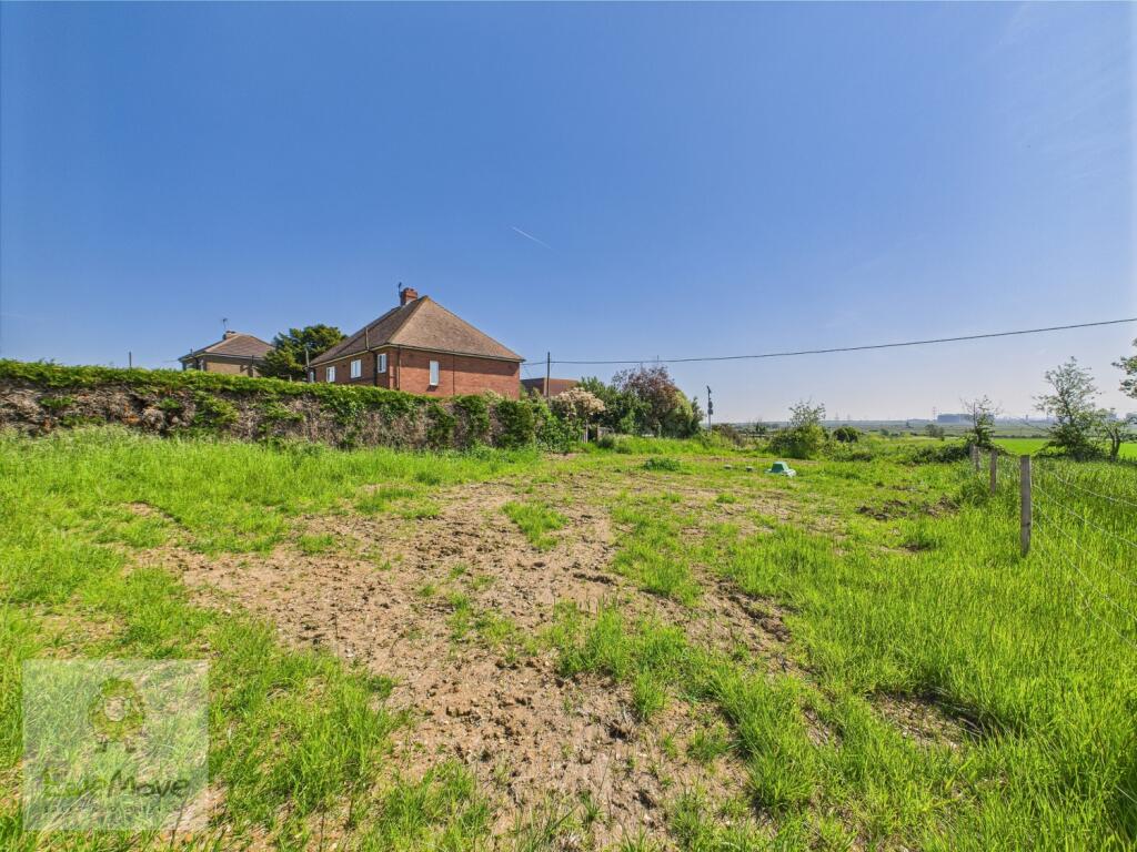 Land Adjacent To The Side Of The Property