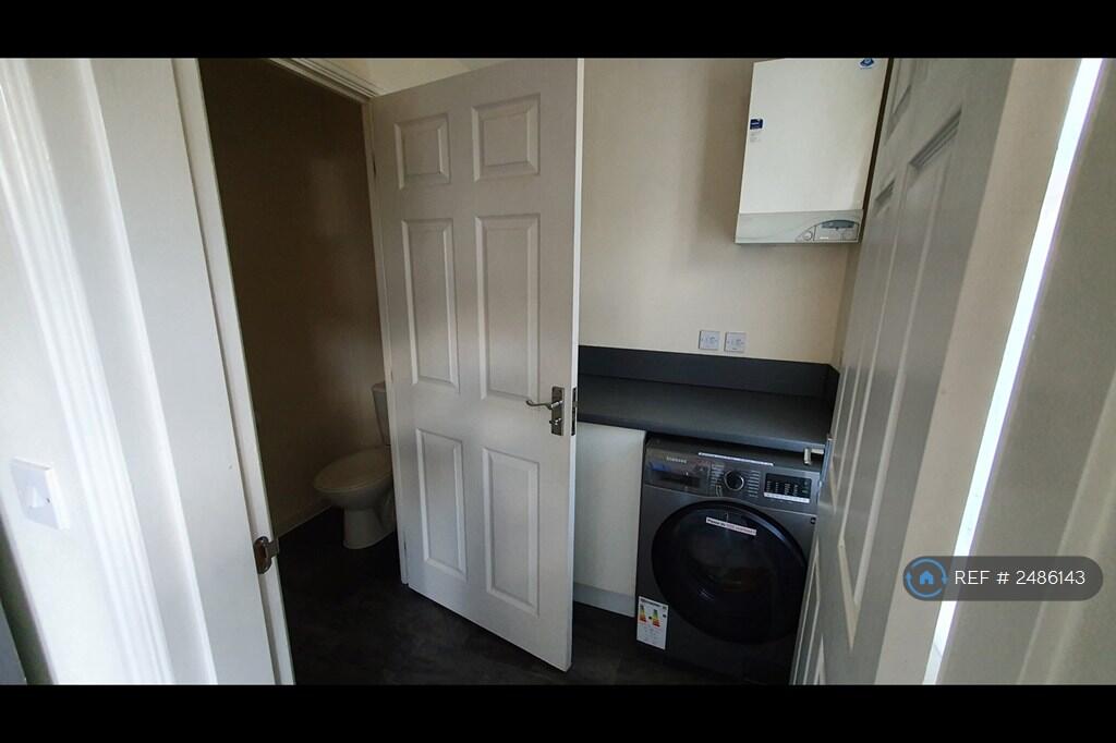 Utility Room + Toilet