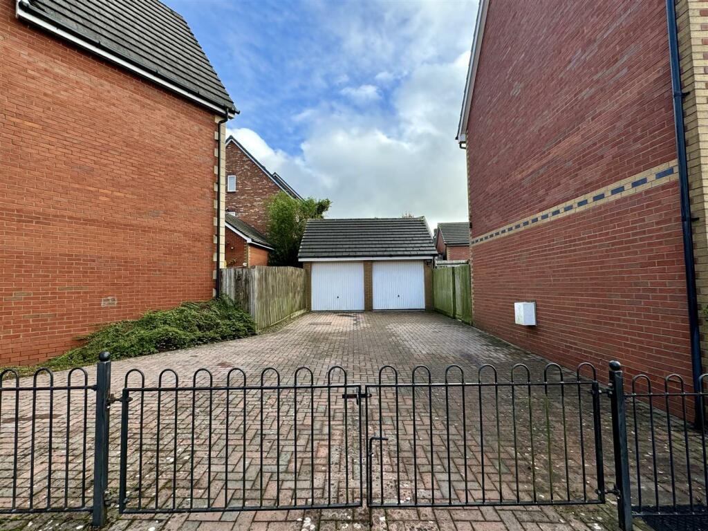 Detached Double Garage and Parking