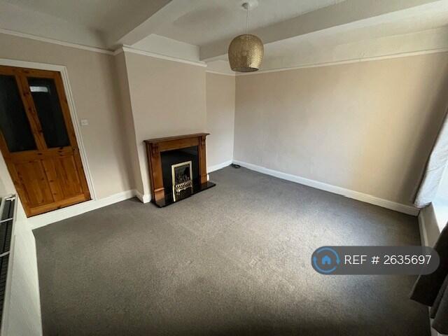 Spacious Lounge With Coal-Effect Gas Fire.