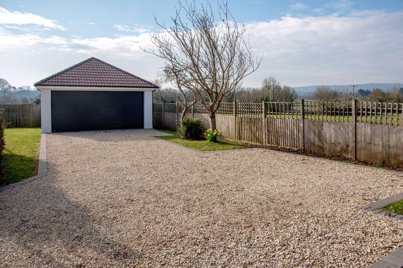 Double garage and driveway