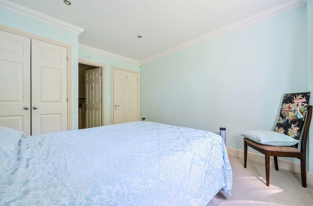 Bedroom One with wardrobes