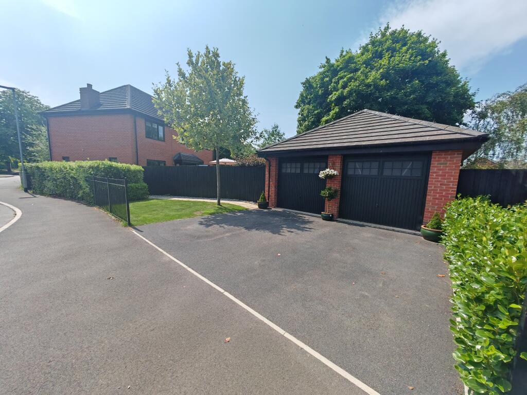 Double garage and parking