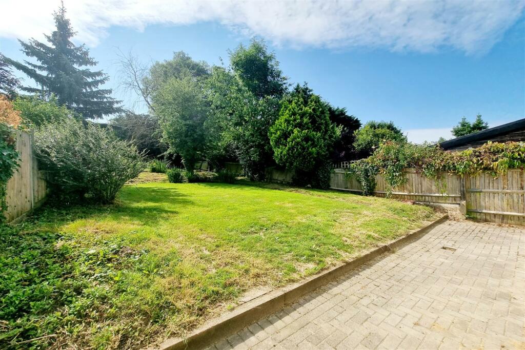 REAR GARDEN &amp; PAVED PATIO AREA: