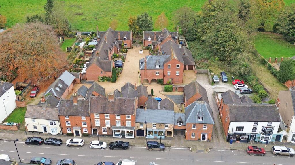Aerial photograph of the site, Millburn in the top right hand corner