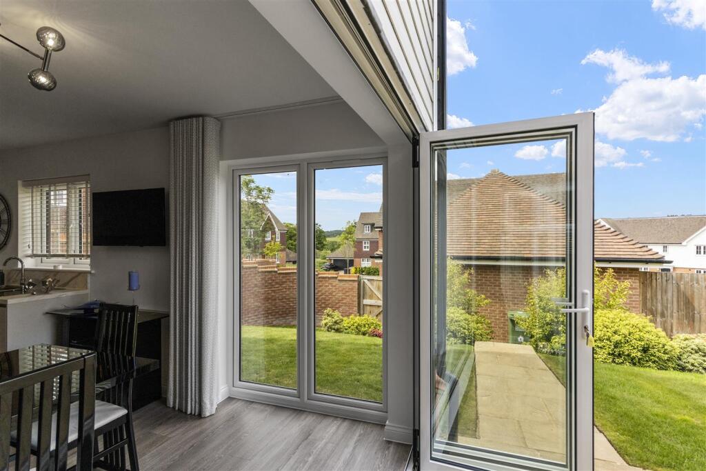 Opens on to Patio Area