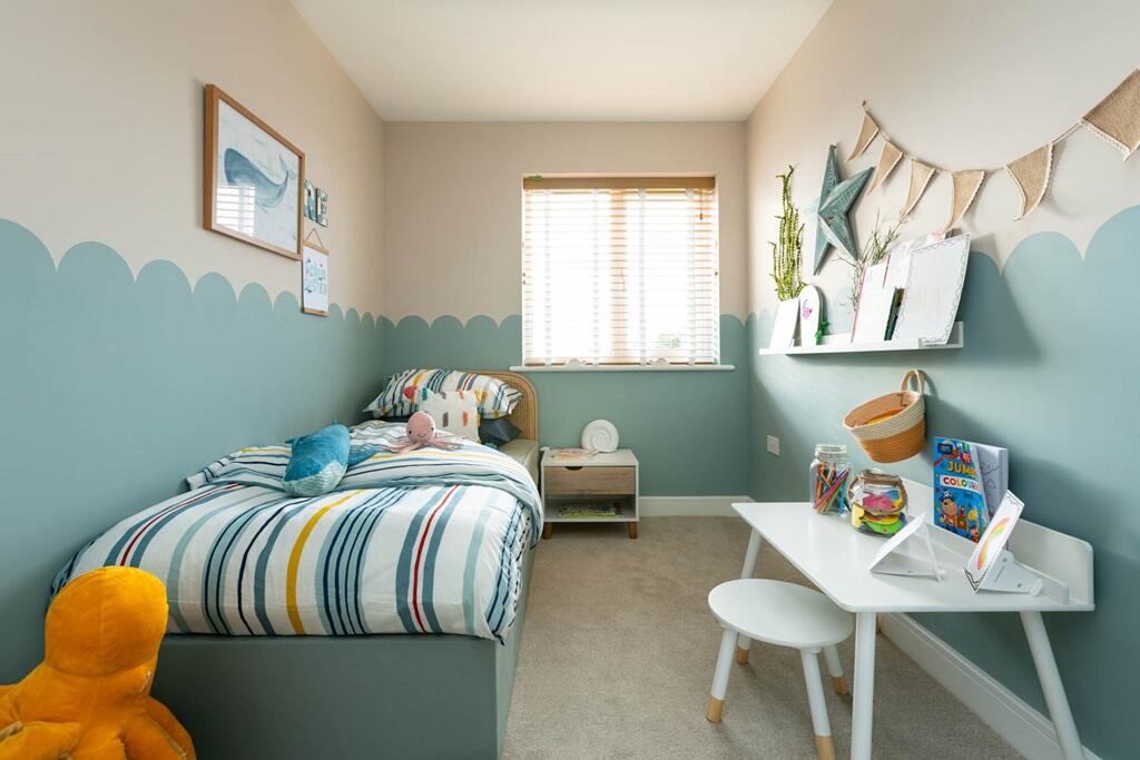 The third bedroom is well suited to a child's room or home office