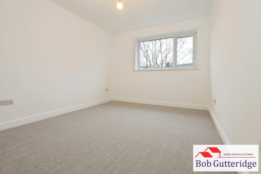 BEDROOM ONE (REAR)