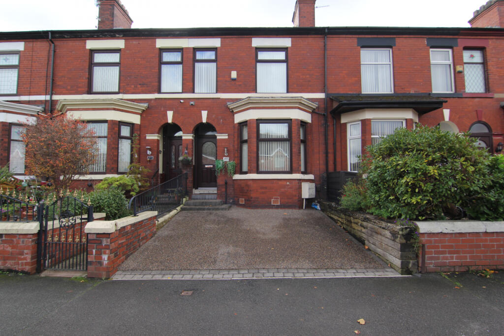 FOUR BEDROOMED BAY FRONTED MID TERRACE