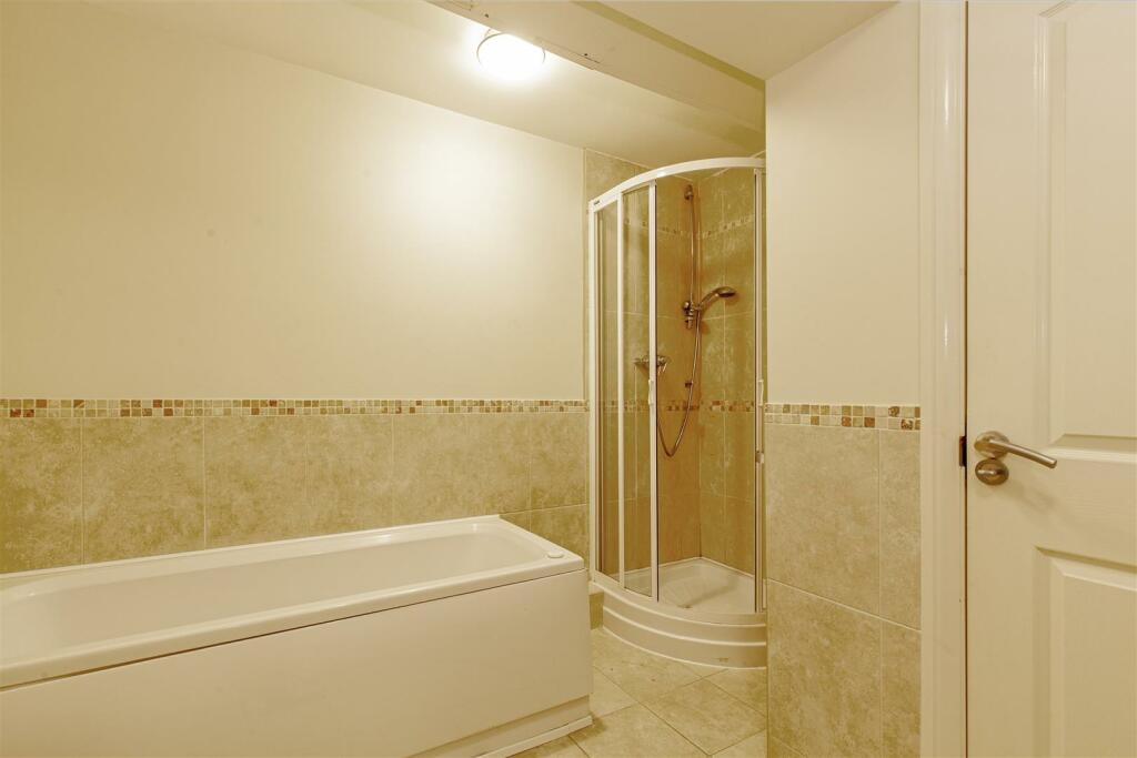 Spacious Partly Tiled Bathroom