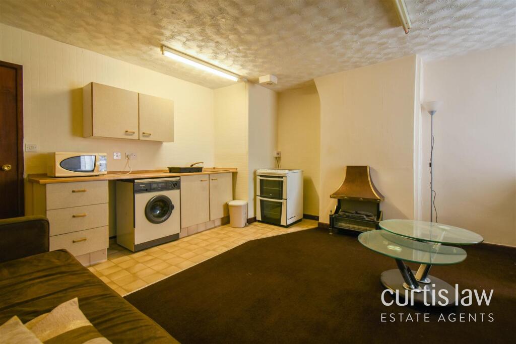 Living Room/ Kitchen
