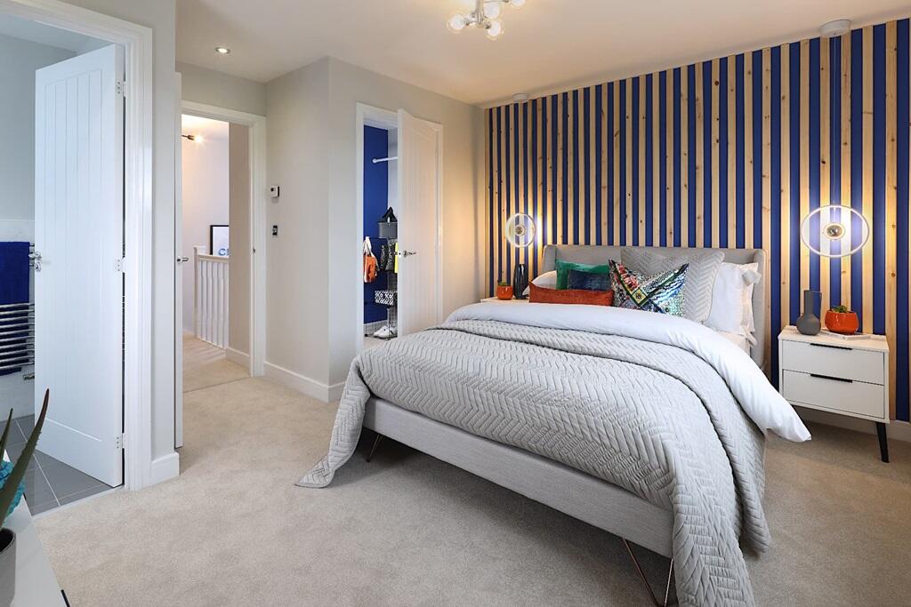 The generous bedroom 1 with walk-in wardrobe and en-suite