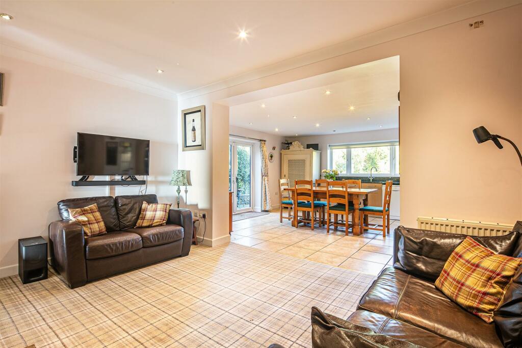 Snug area through to dining kitchen