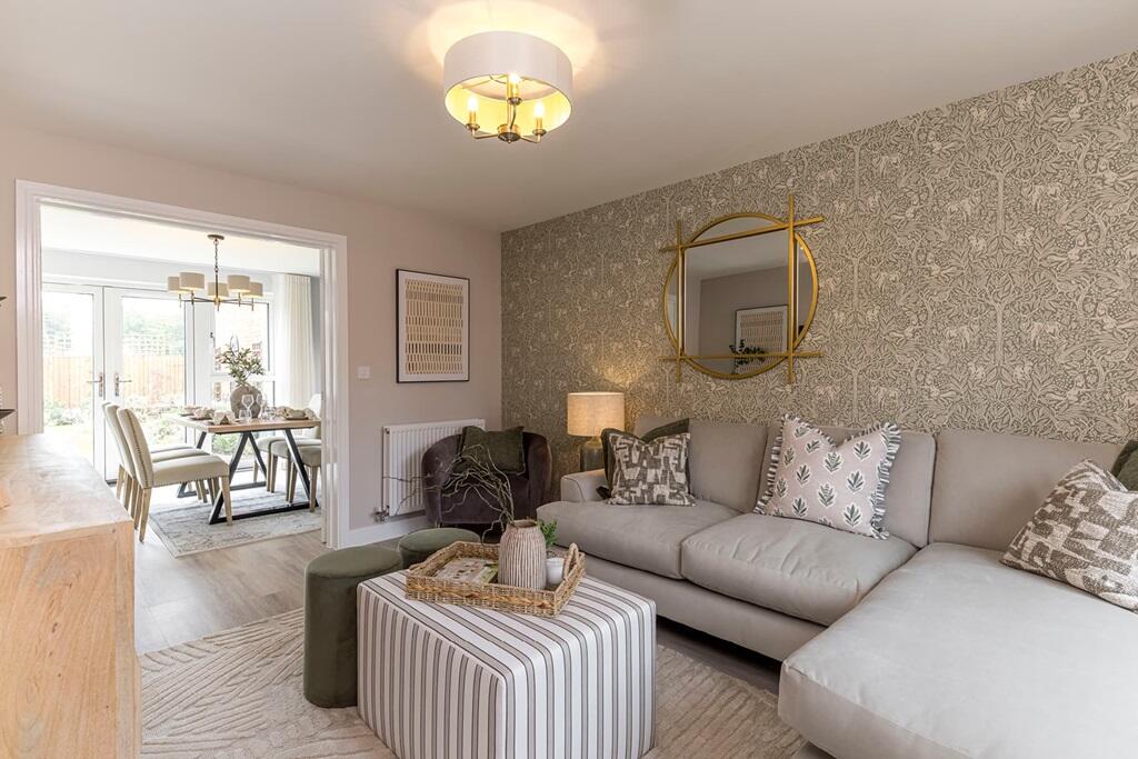 Living area with access through to the kitchen-dining area