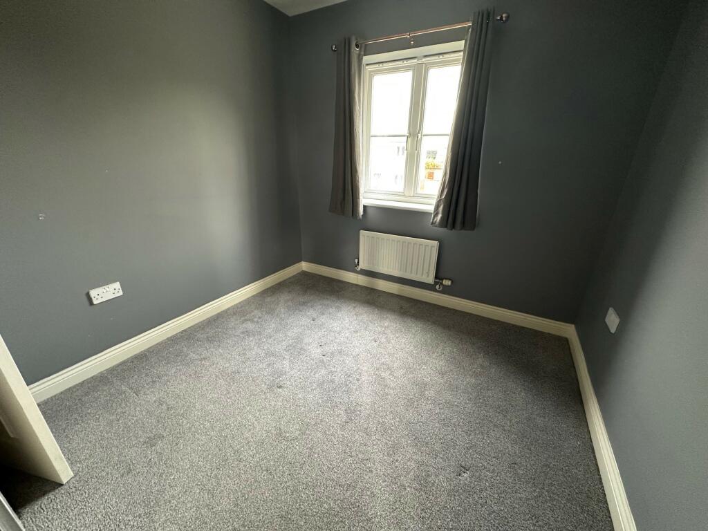 SECOND BEDROOM