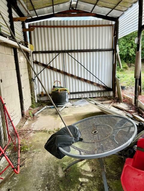 Car Port (In Need Of Attention)